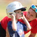 little boy tball player at i9sports with female coach