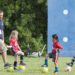 brett bales with soccer players of i9 sports