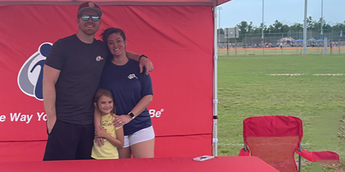 Justin and Tabatha Ward, shown here with their daughter Cori, offer an i9 Sports franchise review.
